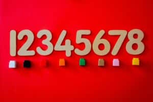 Numbers 1 through 8 on a red background.
