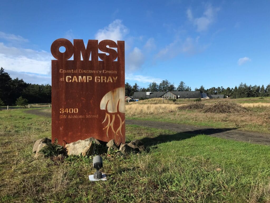Sign at the Coastal Discovery Center at Camp Gray entrance.