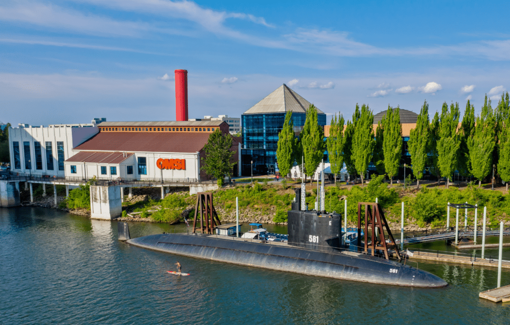 Arial photo of OMSI from the river, featuring USS Blueback