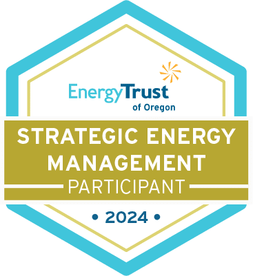 Blue and yellow hexagon with EnergyTrust of Oregon logo with "Strategic Energy Management Participant 2024" written below