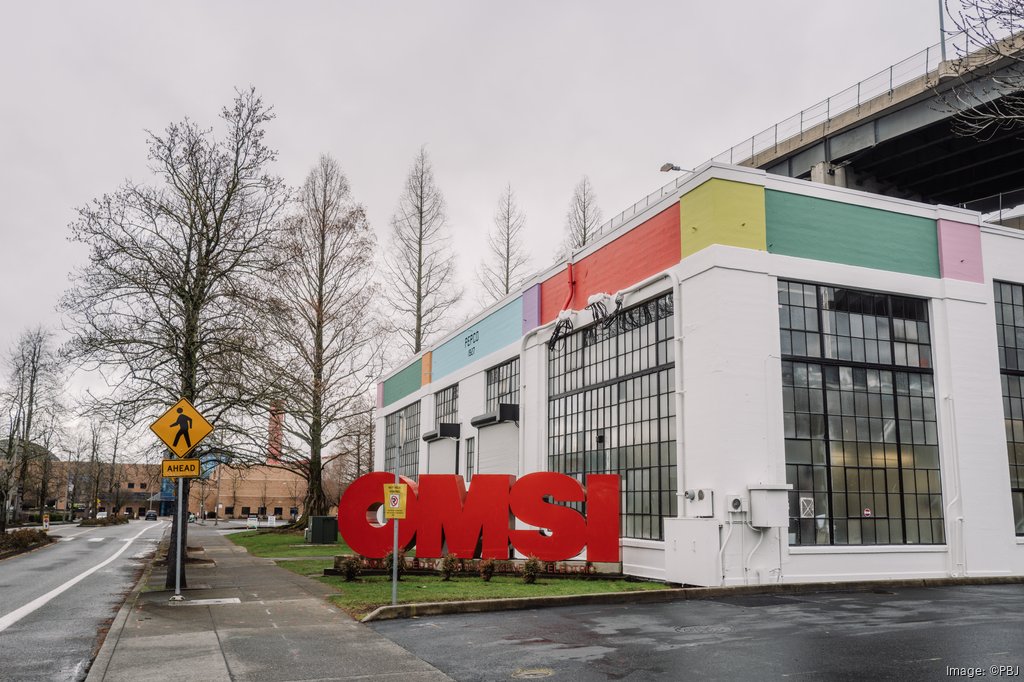 Photo of OMSI-owned building, Pepco, with OMSI sign in front