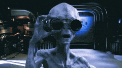 Alien in a spaceship lifting his glasses to get a better look at something