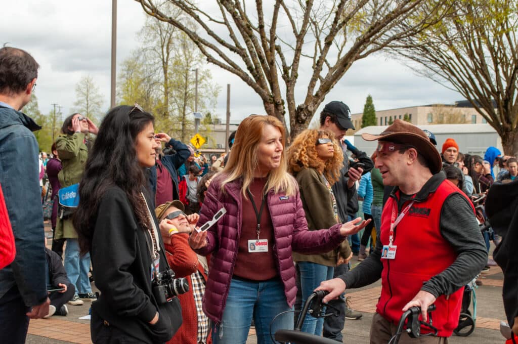 Volunteers at an eclipse viewing event