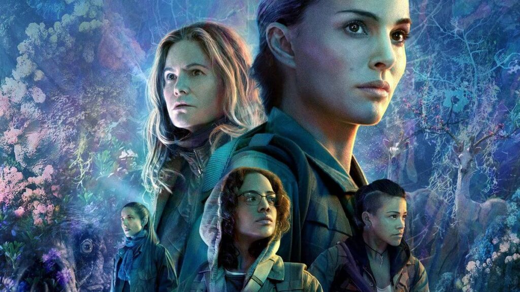 Cover art from Annihilation, featuring profiles of Natalie Portman, Jennifer Jason Leigh, Gina Rodriguez, Tessa Thompson, and Tuva Novotny with an array of imagery in the background, including deer, fungi, trees, and foliage.