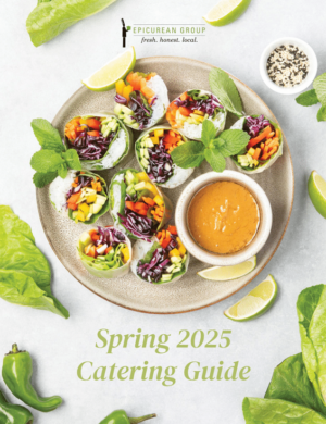 Plate with salad rolls and sauce surrounded by greens and text reading "Spring 2025 Catering Guide"