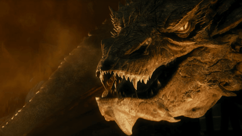 Close-up of a fierce dragon's face snarling, showing sharp teeth and intense, glowing eyes. The dark, smoky background adds a menacing, mythical tone.