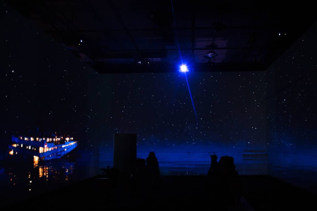 MeyerPro's immersive gallery in TITANIC: The Artifact Exhibition displays the Titanic sinking into the ocean, under hundreds of stars